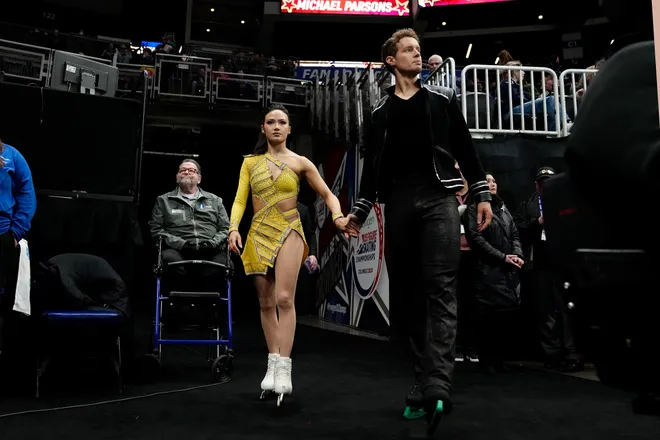 Madison Chock and Evan Bates waits to enter the ice for the championship ice dance rhythm dance during the 2024 US Figure Skating Championships at Nationwide Arena.