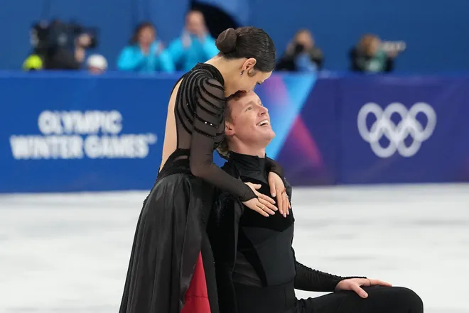 Madison Chock and Evan Bates of the United States of America compete in mixed team free dance during the Milano Cortina 2026 Olympic Winter Games at Milano Ice Skating Arena.