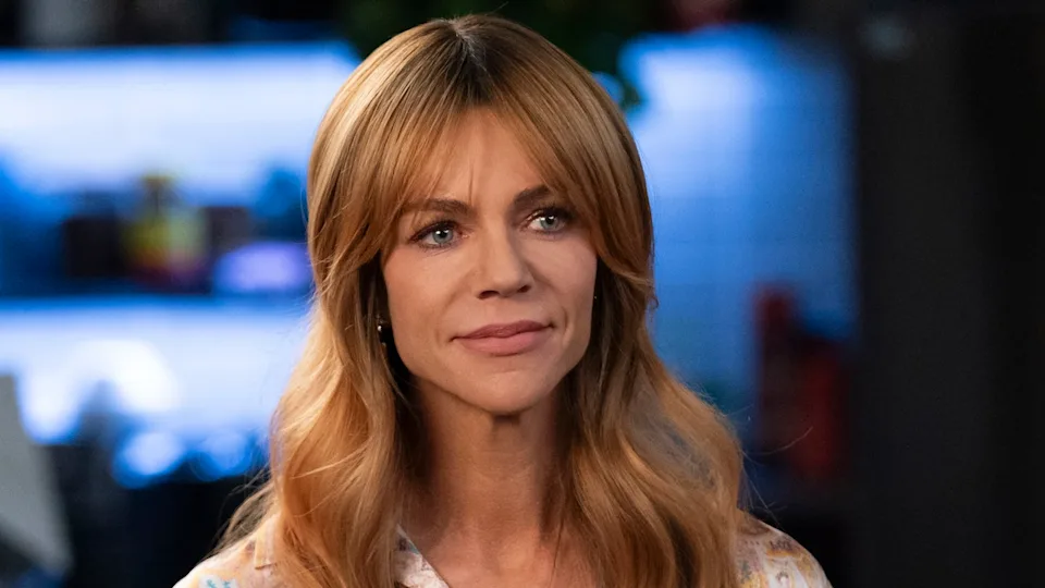 Morgan smiling inside police precinct in High Potential Season 2