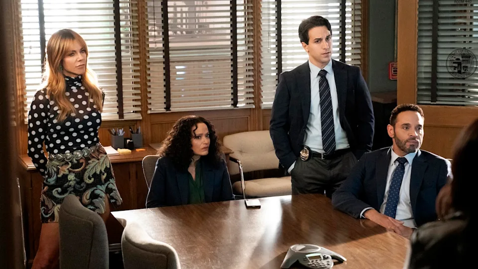 Morgan, Karadec, Oz and Soto sitting around table in High Potential Season 2