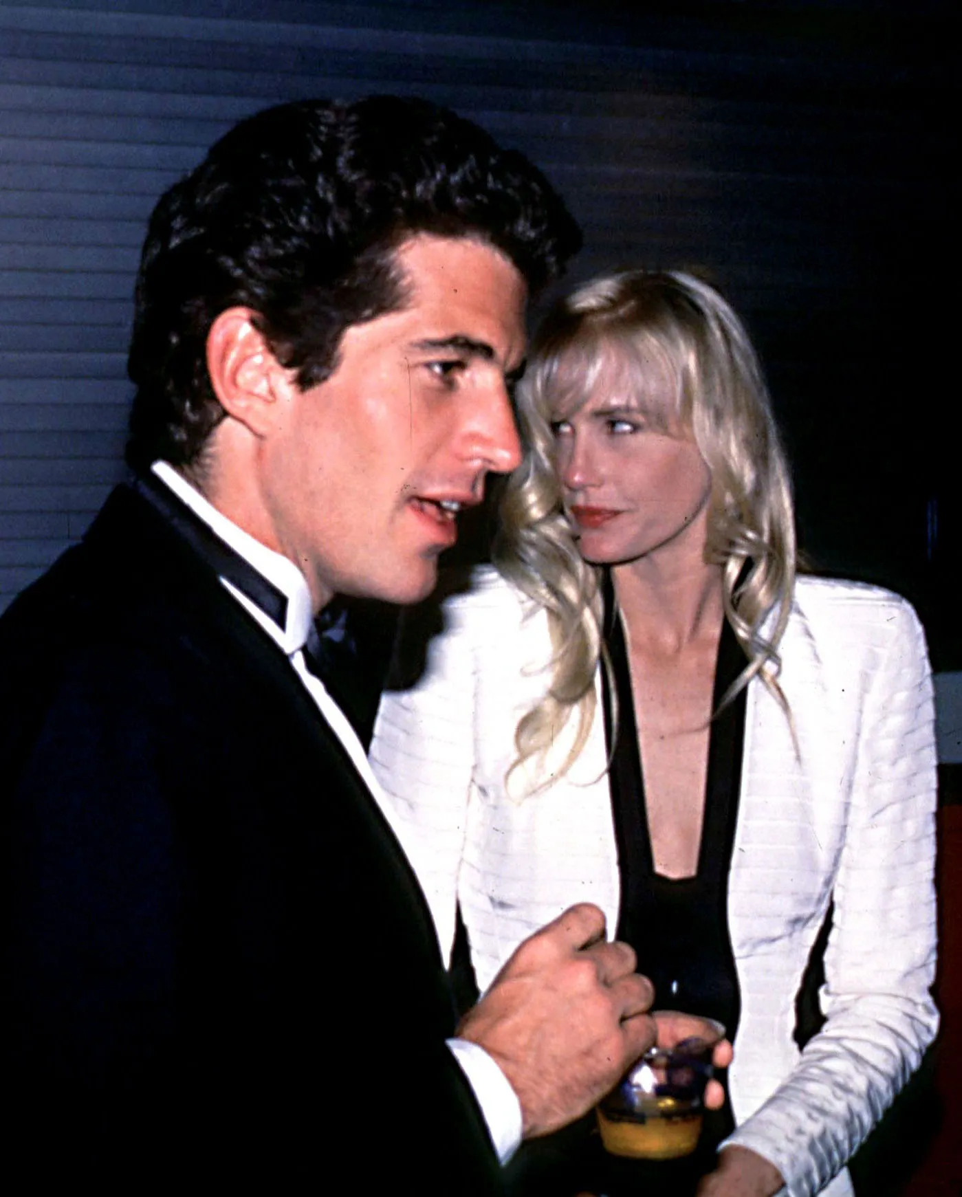 Image may contain John F. Kennedy Jr. Daryl Hannah Face Head Person Photography Portrait Clothing and Formal Wear