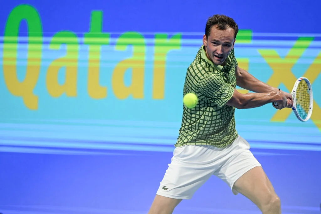 Daniil Medvedev hits a backhand in his match at the 2026 Qatar Open.