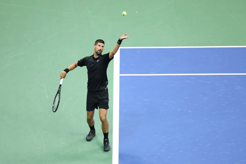 Serbia's Novak Djokovic serves the ball to USA's Learner Tien during their men's singles first round tennis match on day one of the US Open tennis tournament at the USTA Billie Jean King National Tennis Center in New York City, on August 24, 2025.