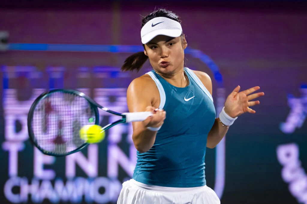 Emma Raducanu of Great Britain in action against Maria Sakkari of Greece during the first round on Day One of the Dubai Duty Free Tennis Championships, part of the Hologic WTA Tour at Dubai Duty Free Tennis Stadium on February 16, 2025 in Dubai, United Arab Emirates