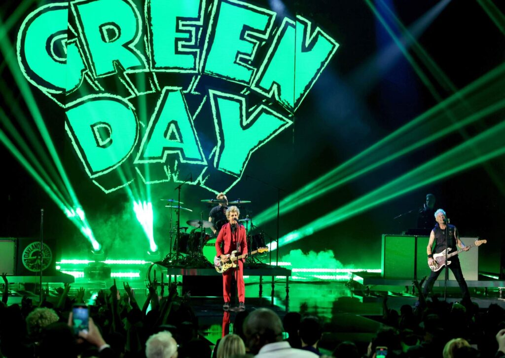 Tré Cool, Billie Joe Armstrong, and Mike Dirnt of Green Day perform onstage during the 2024 iHeartRadio Music Awards at Dolby Theatre in Los Angeles, California on April 01, 2024. (Kevin Winter/Getty Images for iHeartRadio)