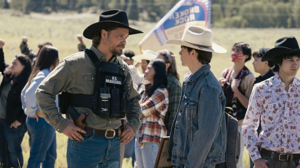 Luke Grimes as Kayce Dutton and Brecken Merrill as Tate Dutton —