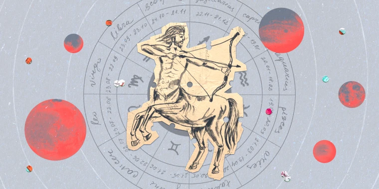 Paper cutout of the Sagittarius zodiac on a gray background