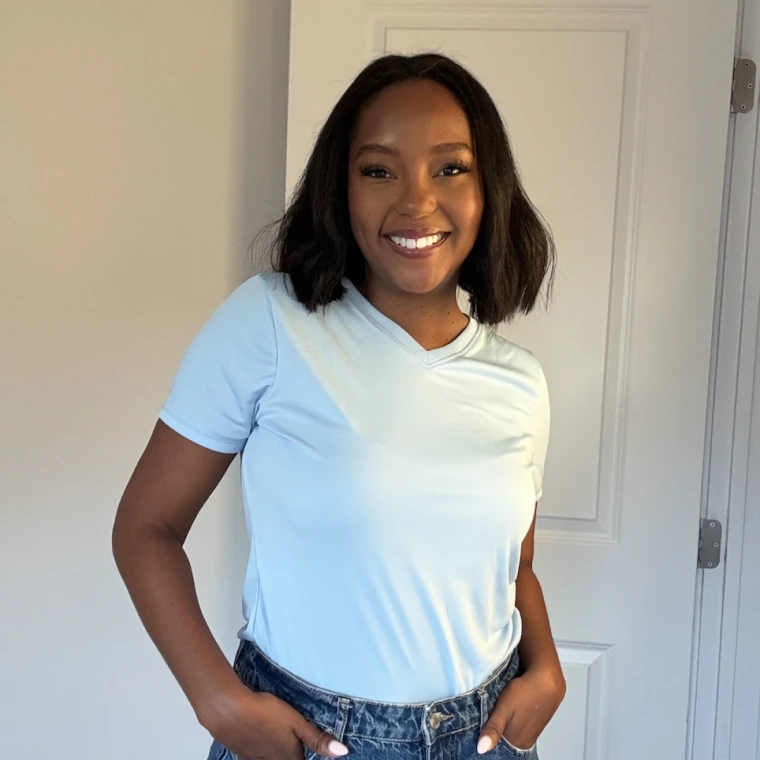 Shop TODAY contributor Makho Ndlovu models the Hanes Women's Sport Cool Dry V-Neck T-Shirt.