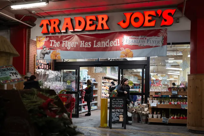 Customers shop at a Trader Joe's store on December 10, 2025, in Chicago, Illinois.