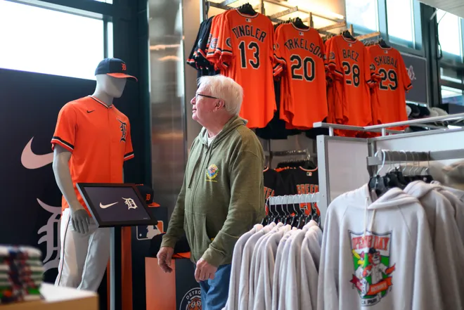 Rick Szymanski of Grosse Pointe shops for Tigers merchandise at the D Shop, inside Comerica Park.