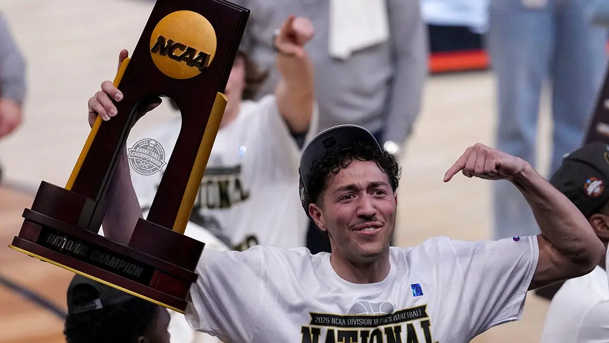 Mary Washington Eagles celebrating on basketball court at Gainbridge Fieldhouse