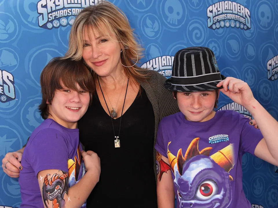 Lisa Ann Walter and sons Spencer and Simon arrive at Skylanderss Spyro's Adventure Halloween Event on October 29, 2011 in Los Angeles, California.Credit: Paul Redmond/WireImage