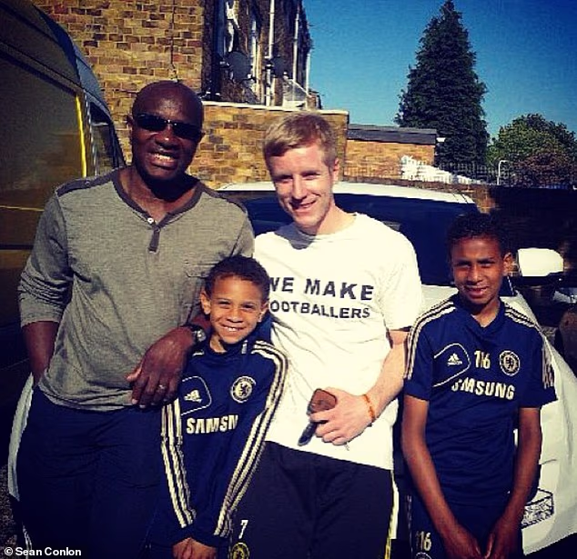 Olise (right) with coach Sean Conlon, his brother Richard and their dad Vincent during his academy days at Chelsea
