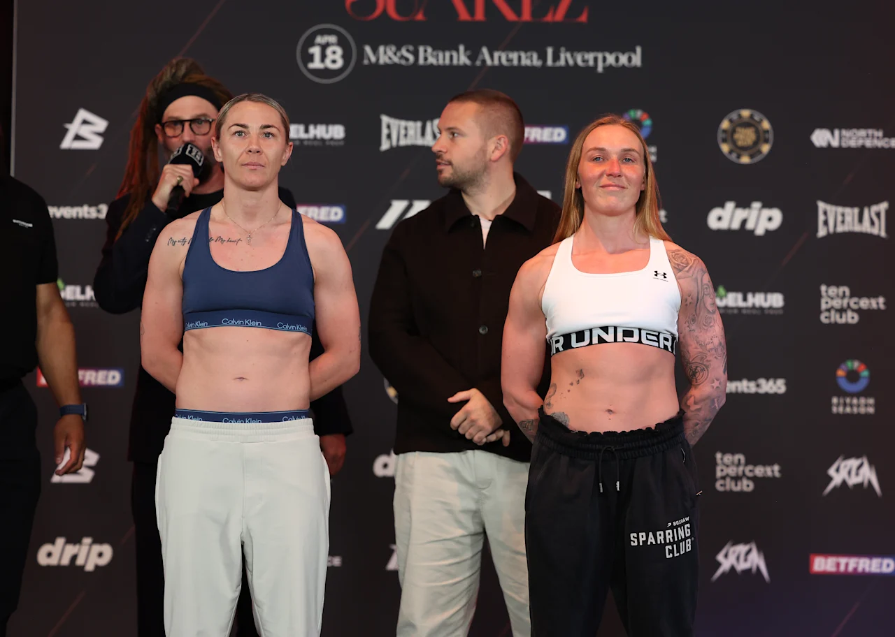 LIVERPOOL, ENGLAND - APRIL 17: Molly McCann (dark top) and Ashleigh Johnson (white top) during Weigh In ahead of their Super Bantamweight Contest Tomorrow night in Liverpool, England. (Photo by Mark Robinson/Getty Images).