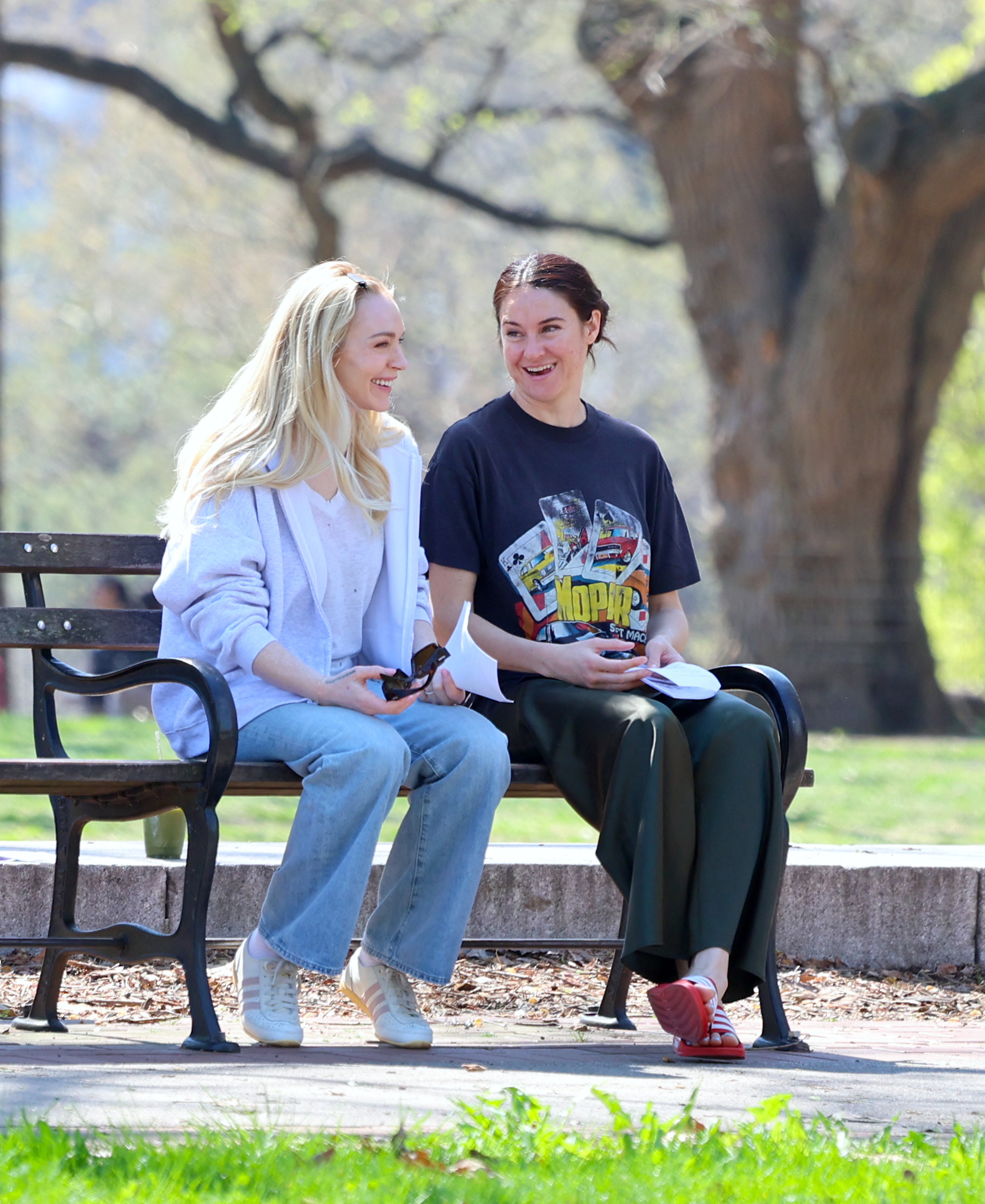 Lindsay Lohan (left) and Shailene Woodley film their new Hulu show, “Count My Lies,” on a bench at Fort Greene Park in Brooklyn.
