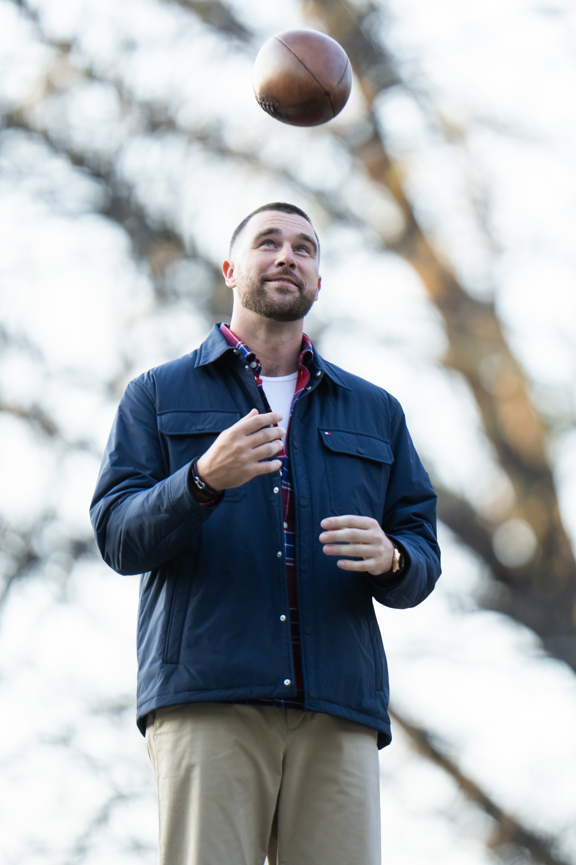 Kansas City Chiefs tight end Travis Kelce tosses a ball for his Tommy Hilfiger campaign in Central Park.