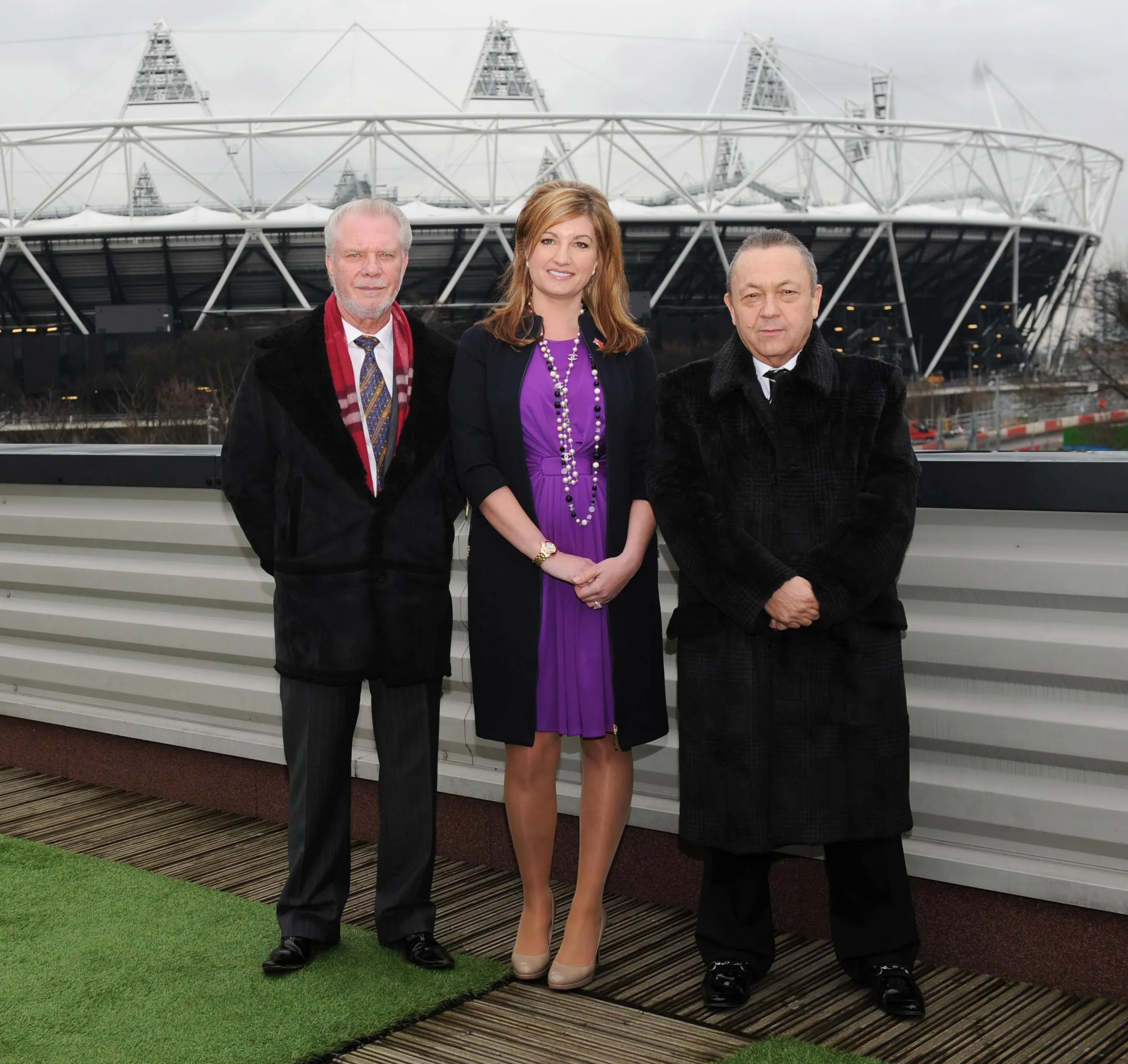 West Ham United co-chairmen David Gold and David Sullivan, and vice-chairman Karren Brady stand in front of the Olympic Stadium.