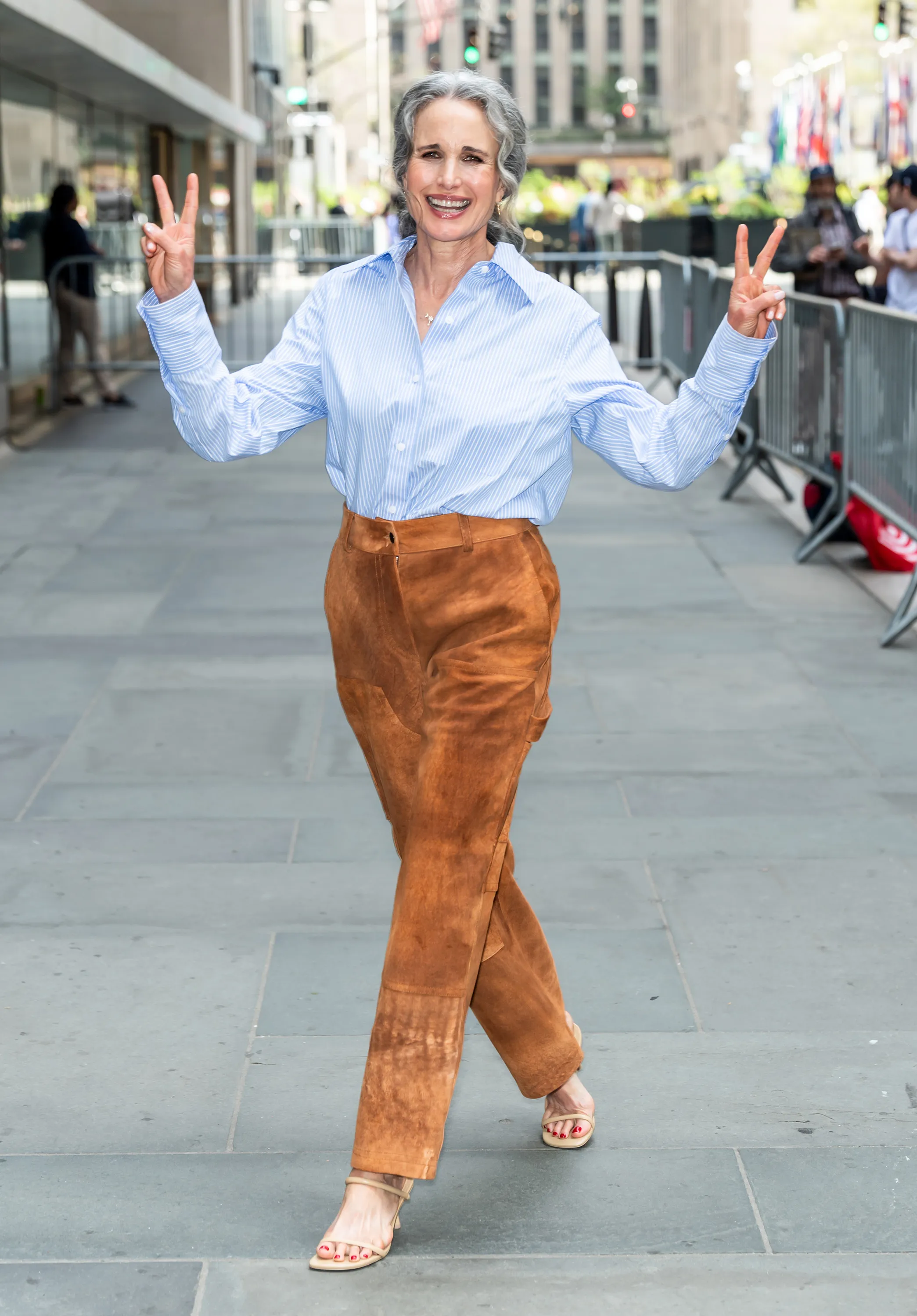 Andie MacDowell has us under her suede at Rockefeller Center.