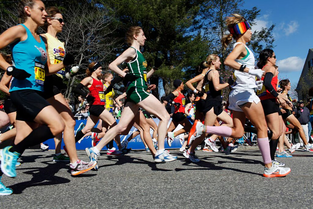 The Elite Women start the race for the 2011 Boston Marathon in Hopkinton. The clear skies and relatively cool temperatures in the 40s and low 50s made for ideal long-distance running conditions.