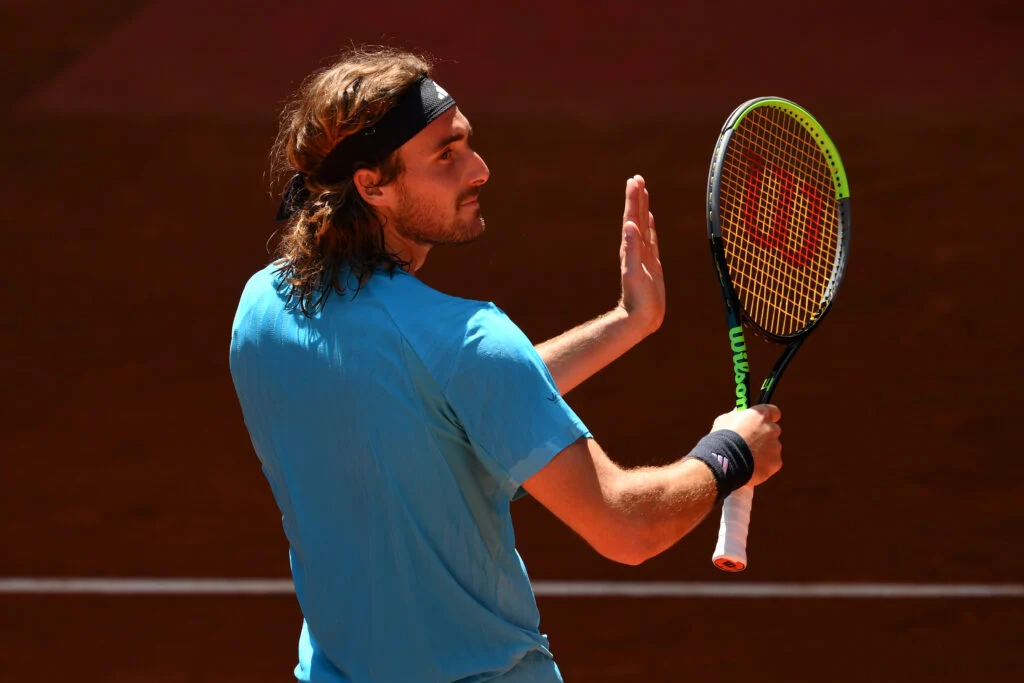 Stefanos Tsitsipas of Greece celebrates winning match point against Daniel Merida of Spain during their game on Day 8 of the Mutua Madrid Open at La Caja Magica on April 27, 2026 in Madrid, Spain.