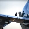 President Trump, seen here boarding Air Force One on April  29, says Qatar has offered to give the Defense Department a new presidential jet. 