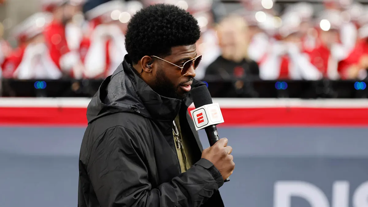 ESPN analyst P.K. Subban standing at Carolina Hurricanes practice at Carter-Finley Stadium