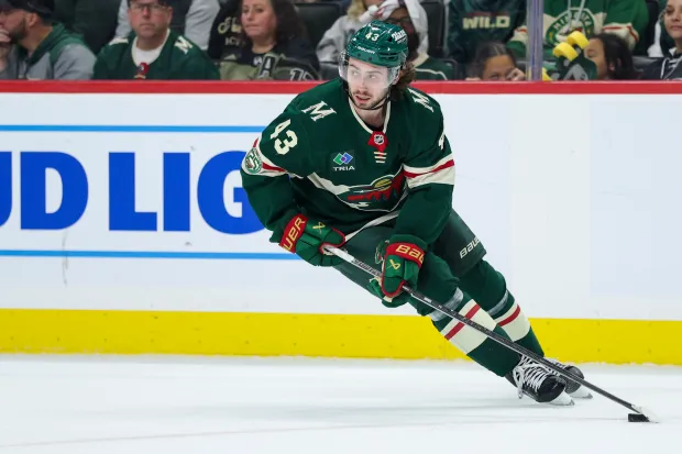 Quinn Hughes #43 of the Minnesota Wild skates with the puck against the Dallas Stars during the second period in Game 6 of the First Round of the 2026 Stanley Cup Playoffs at Grand Casino Arena on April 30, 2026 in St Paul, Minnesota. (Photo by David Berding/Getty Images)