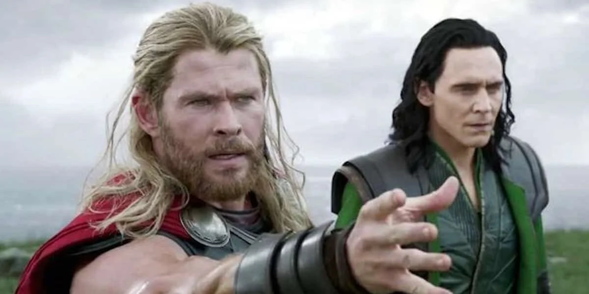 Thor trying to grab Mjolnir with Loki next to him
