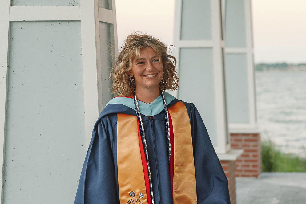 15-year-old college graduate earns education degree, shares family’s love for Liberty