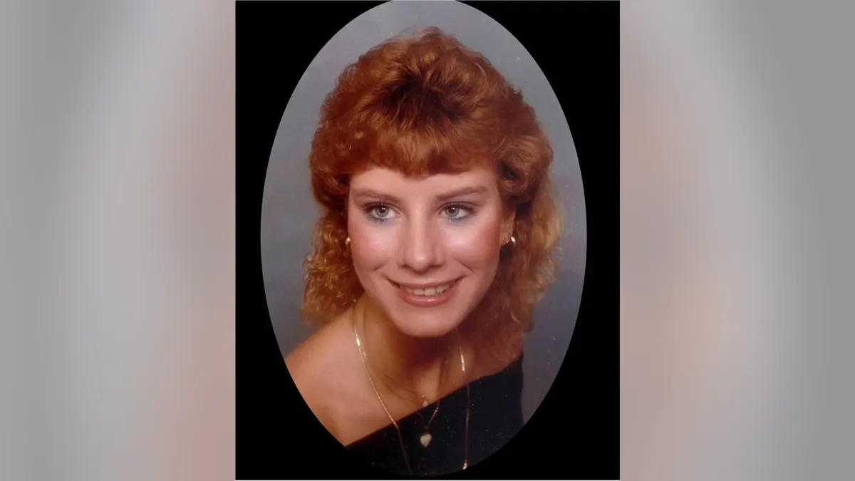 Lisa Robertson's high school portrait.