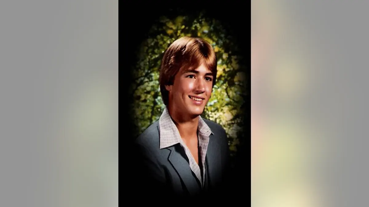 A high school portrait of Al Robinson.