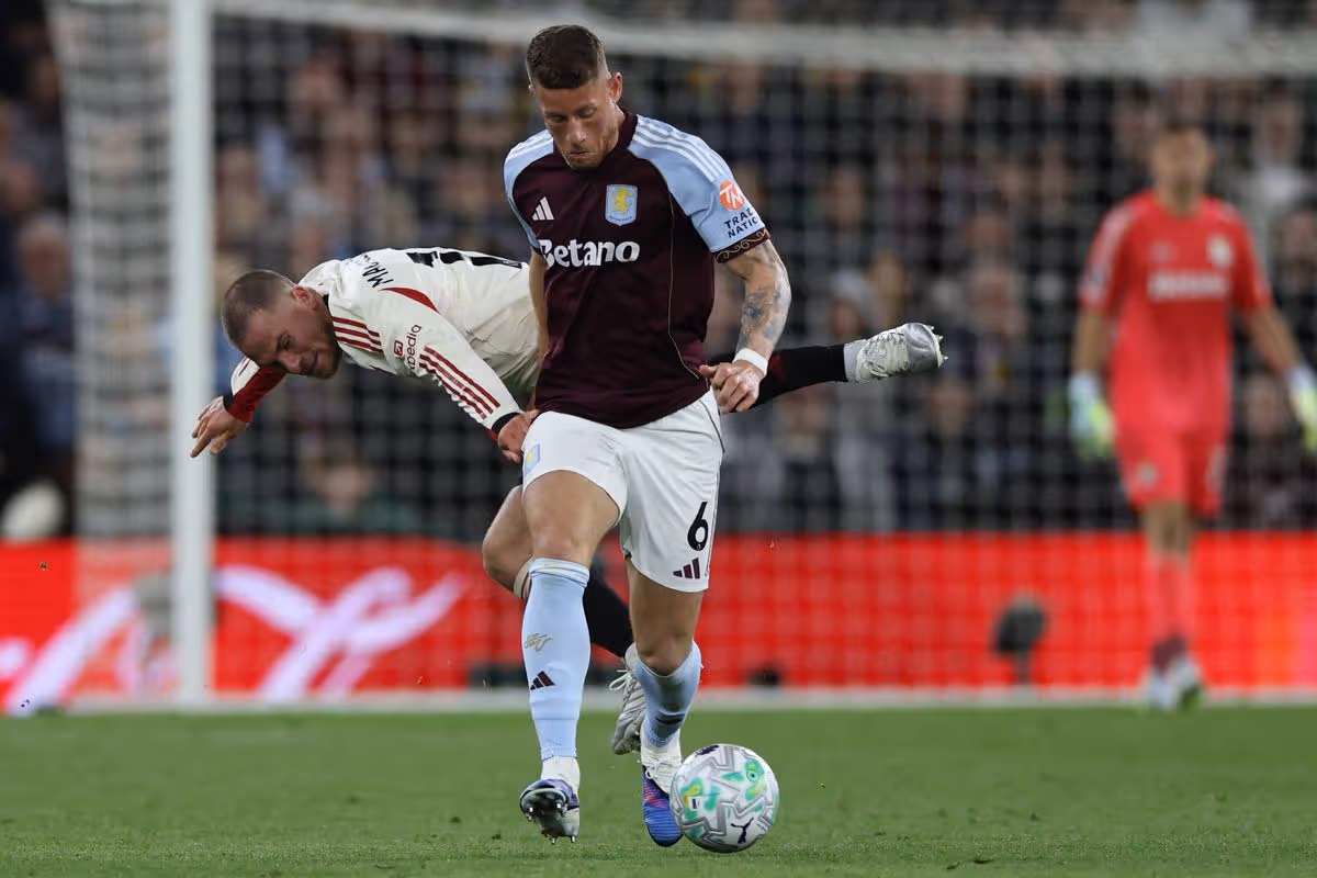 Liverpool's Argentinian midfielder #10 Alexis Mac Allister (L) vies with Aston Villa's English midfielder  #06 Ross Barkley (C) during the English Premier League football match between Aston Villa and Liverpool at Villa Park in Birmingham, central England on May 15, 2026. (Photo by Darren Staples / AFP via Getty Images) / RESTRICTED TO EDITORIAL USE. No use with unauthorized audio, video, data, fixture lists, club/league logos or 'live' services. Online in-match use limited to 120 images. An additional 40 images may be used in extra time. No video emulation. Social media in-match use limited to 120 images. An additional 40 images may be used in extra time. No use in betting publications, games or single club/league/player publications. / 