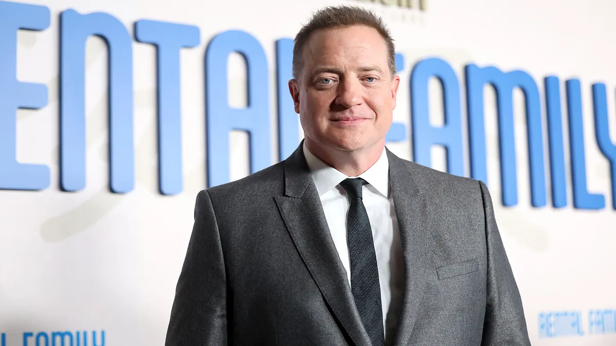 Brendan Fraser posing on the red carpet at the Rental Family Los Angeles premiere