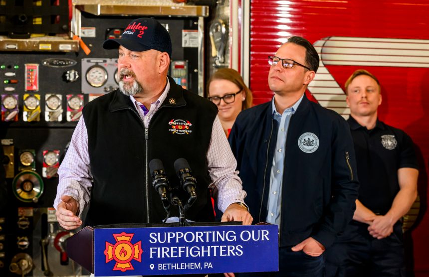 Bob Brooks, president of the Pennsylvania Professional Fire Fighters Association, speaks as Gov. Josh Shapiro visits the fire department in April 2025 in Bethlehem, Pennsylvania. 