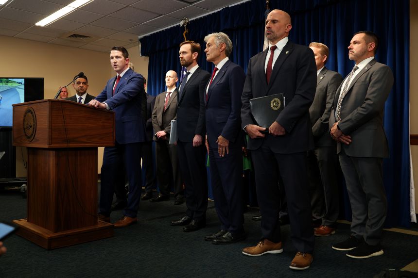 Assistant Attorney General for the National Fraud Enforcement Division Colin McDonald addresses media to announce actions for combating fraud in Minnesota at a news conference on Thursday in Minneapolis.
