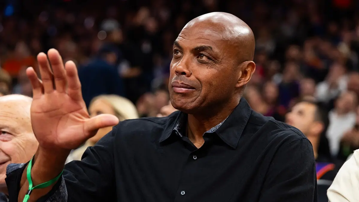Charles Barkley sitting courtside at an NBA game in Phoenix