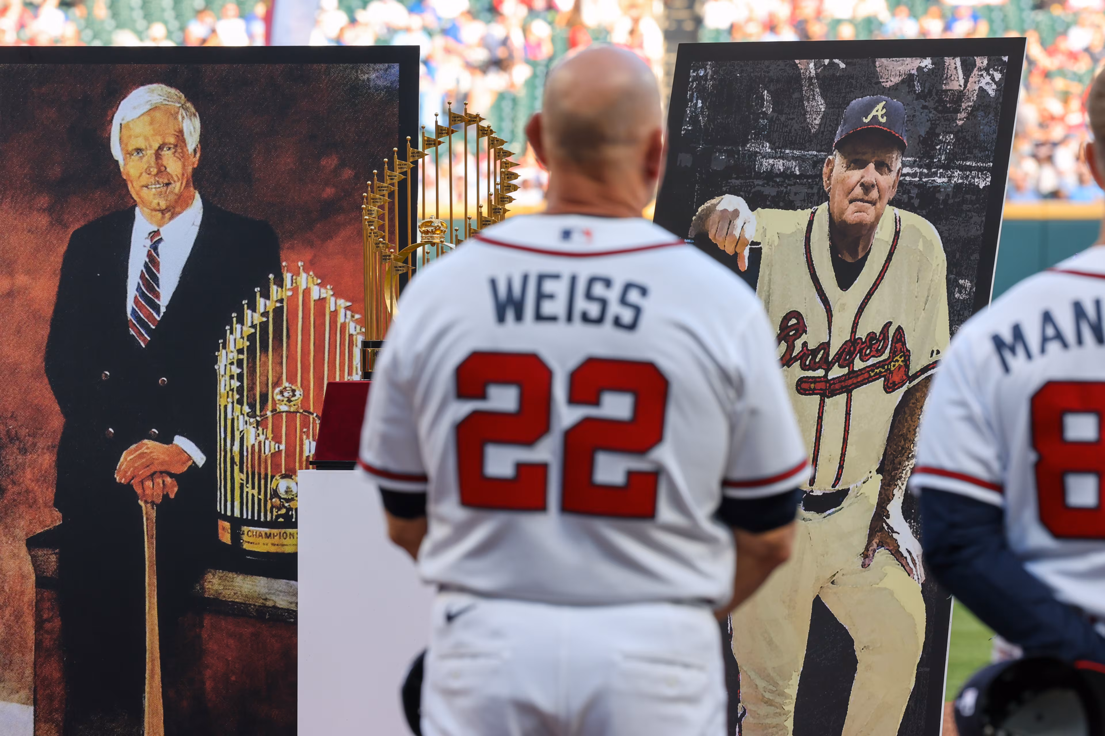 Braves manager Walt Weiss stands during a tribute to the team’s late iconic owner Ted Turner (left) and legendary manager Bobby Cox on Tuesday, May 12, 2026, at Truist Park in Atlanta. (Arvin Temkar/AJC)