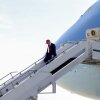 President Trump walks off Air Force One on April 29 at Selfridge Air National Guard Base, Michigan. Qatar has offered to replace Air Force One with a luxury Boeing 747 jet.