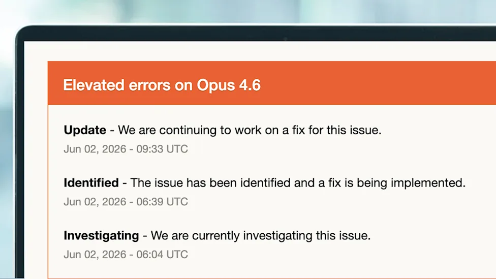 A laptop screen showing 'elevated errors' on Claude's status page.