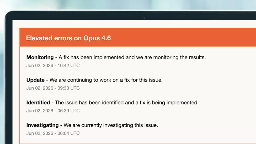 A laptop screen showing 'elevated errors' on Claude's status page