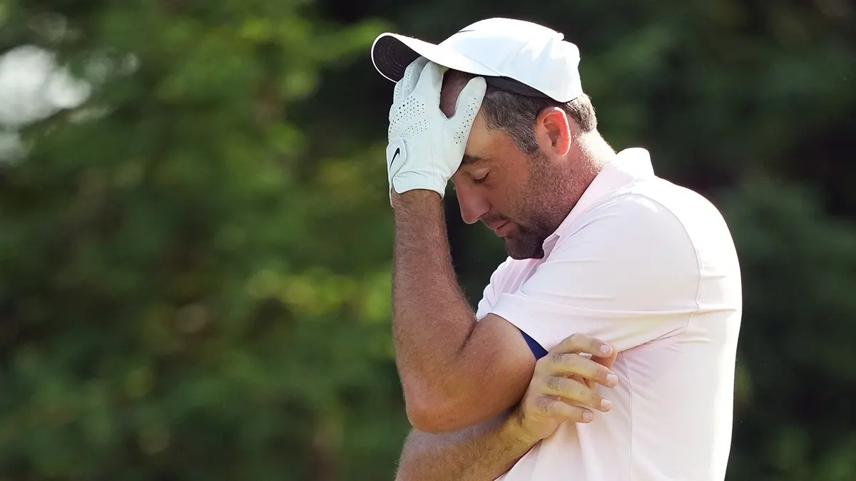Scottie Scheffler reacting to his tee shot on the 16th hole at Muirfield Village Golf Club
