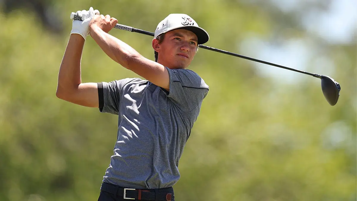 Miles Russell plays his tee shot