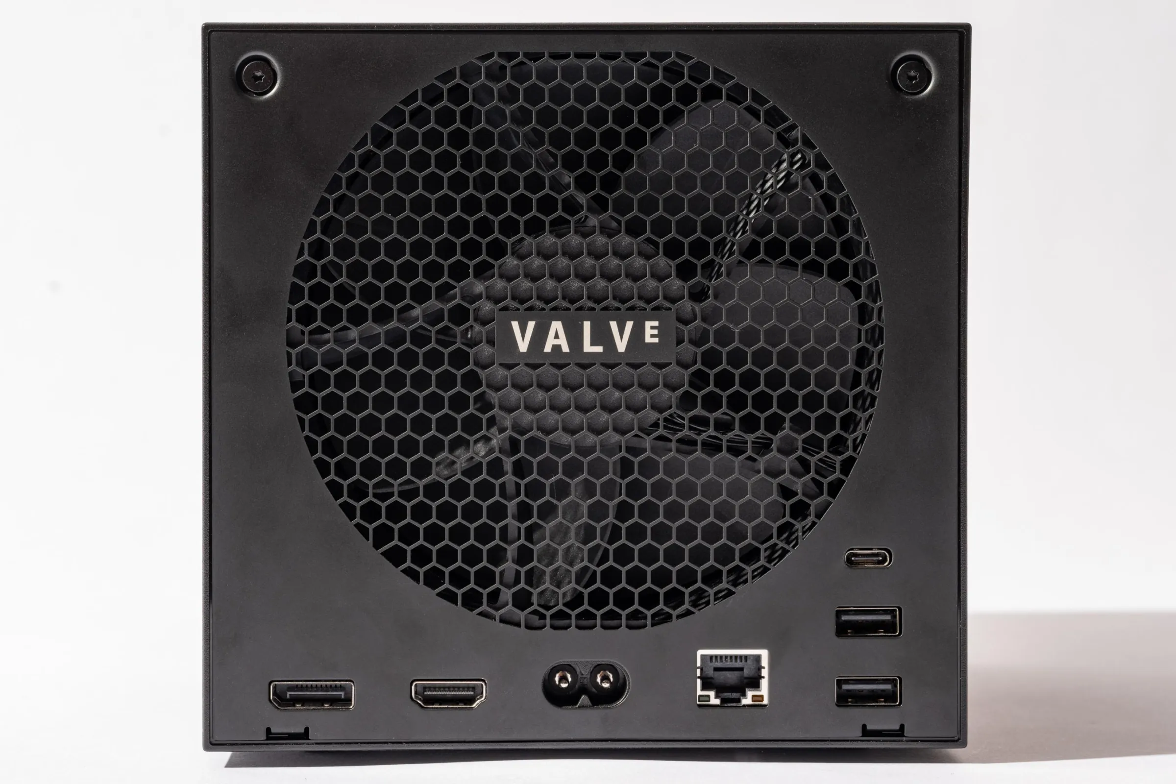Valve’s design, a clever stack of large fan and integrated power supply, makes this cube small, quiet, and cool.