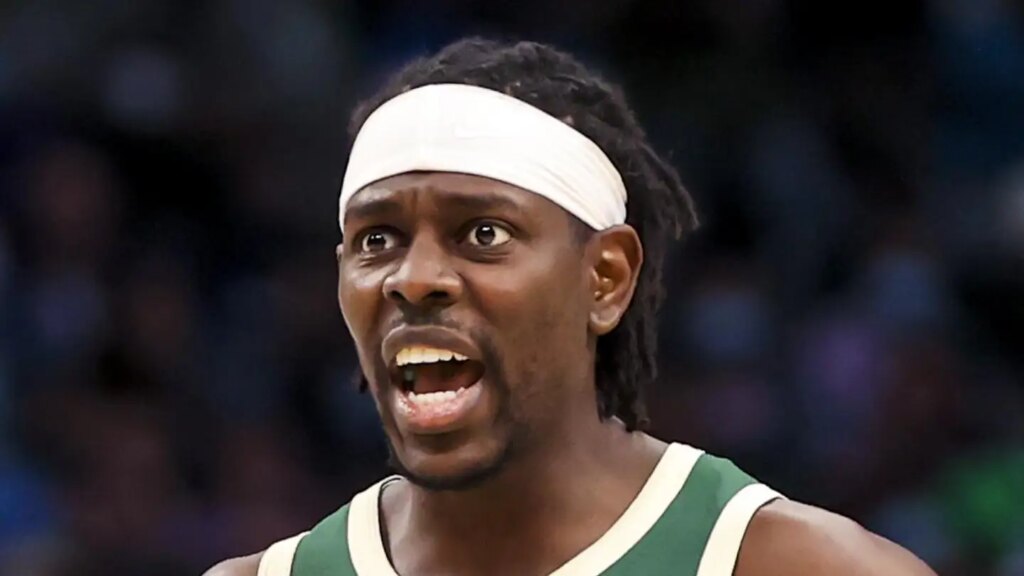 Milwaukee Bucks guard Jrue Holiday (21) reacts during the second half against the Dallas Mavericks at American Airlines Center on Dec 23, 2021.