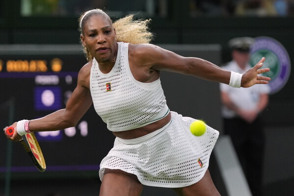 Serena Williams of the United States plays a forehand against Maya Joint of Australia in their first round women's singles match at the Wimbledon Tennis Championships in London, Tuesday, June 30, 2026. (AP Photo/Maja Smiejkowska)