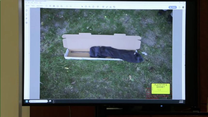 A photo shown in a preliminary hearing for Tyler Robinson shows the rifle prosecutors allege was used in the killing of Charlie Kirk wrapped in a towel.