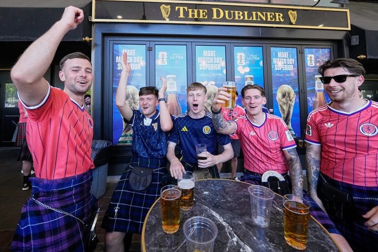 Scottish fans drink and sing at a pub in central Boston last month.