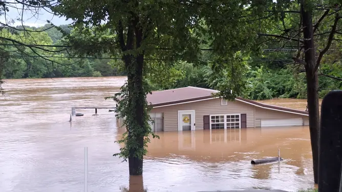 Another angle of a flooded home in Lesterville, Missouri.
