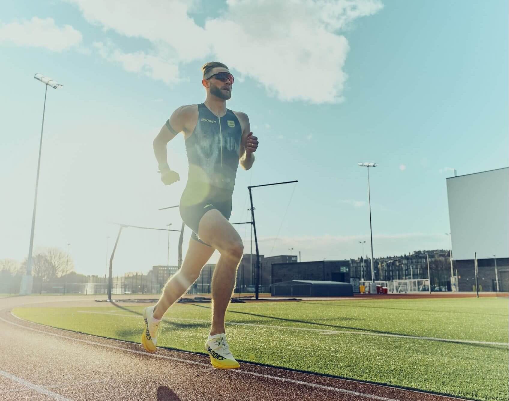 Josh Kerr running on the track during training on a sunny day in New Mexico 