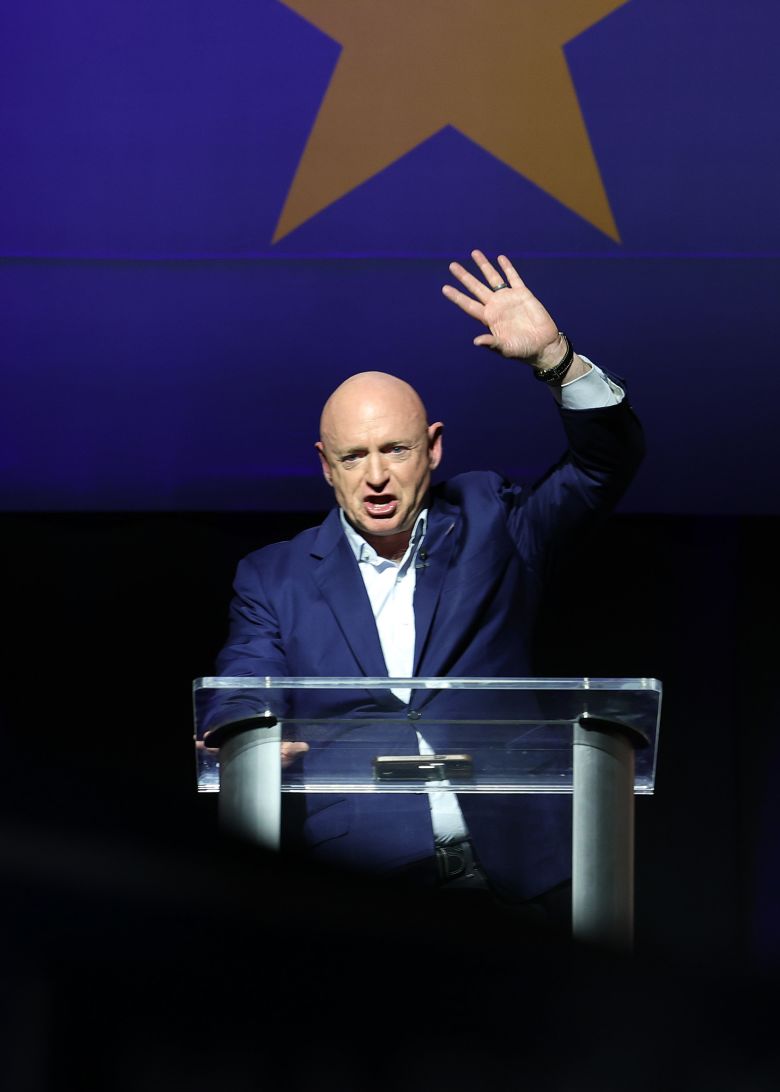 Sen. Mark Kelly delivers remarks to supporters at his reelection night rally in Tucson, Arizona, on November 8, 2022.